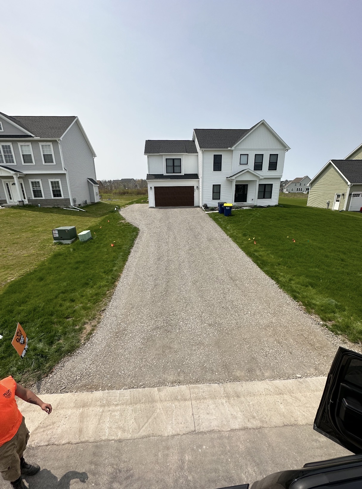 Graded stone driveway installed at a new construction home