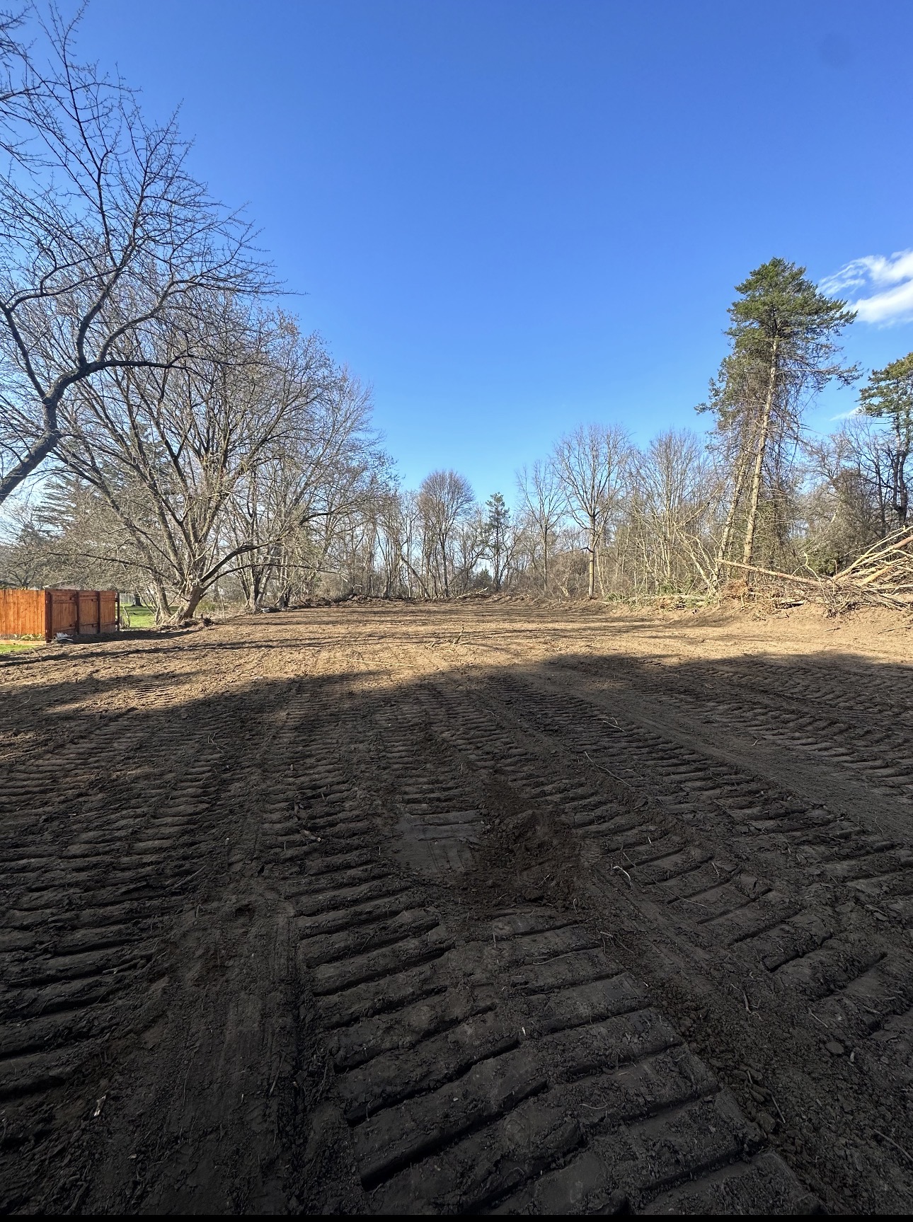 Cleared and rough-graded lot ready for construction
